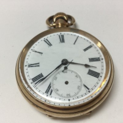 A gold plated pocket watch.