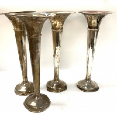 4 vintage silver plated trumpets. 30.5cm (C)