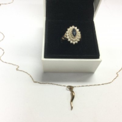 A 9ct gold ring set with sapphires plus a 9ct gold horn of plenty pendant, approx total weight 4.8g. Shipping category A.