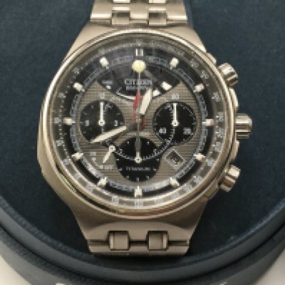 A boxed citizen eco drive wrist watch. Seen running. Approximately 45mm case. Postage B