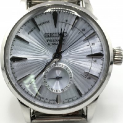 A Seiko Presage cocktail time gents watch. 42mm case. Comes with original strap and box with papers. Seen running.
