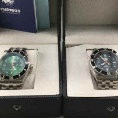 Two Phoibos gents watches. One with green dial and other with black dial. With boxes and both running. Postage B
