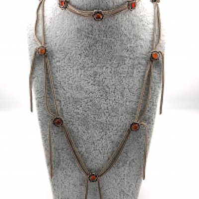 A French silver and amber necklace and bracelet suite, in need of restoration. (A)