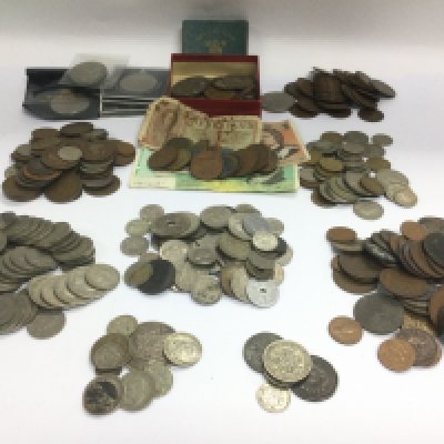 A collection of various coins and banknotes. Shipping category B.