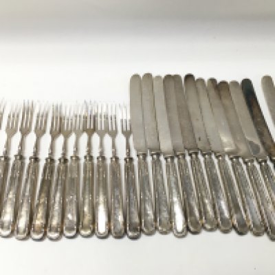 A collection of silver hallmarked cutlery including knives and forks. Postage category B