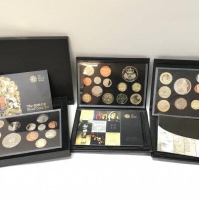 Three uncirculated year sets, 2009, 2010 and 2011. Postage category C