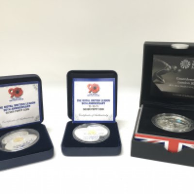 Two cased Silver Poppy coins and a Countdown to London 2012 2011 Silver Piedfort &pound;5 coin. Postage category B