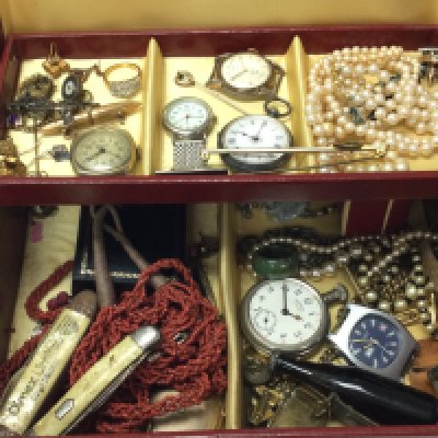 A collection of costume jewellery including mother of pearl pen knives, pearl necklaces, a silver hallmarked cased pocket watch, various other pocket watches, silver hallmarked ring etc. postage category C