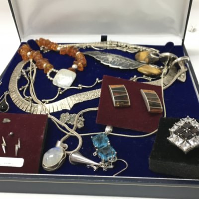 A mixed collection of silver costume jewellery including necklaces, earrings, a bracelet etc. Some items not silver. Postage category B