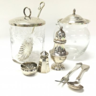 Silver Sterling topped preserve pots, a silver hallmarked shaker, other silver sterling items. This lot cannot be posted