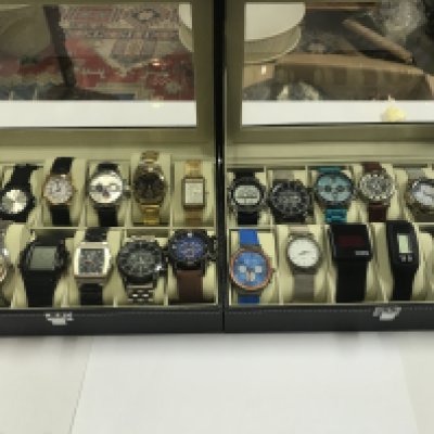Two watch boxes containing a collection of assorted dress watches including Daniel Hechter Orion etc. Postage B