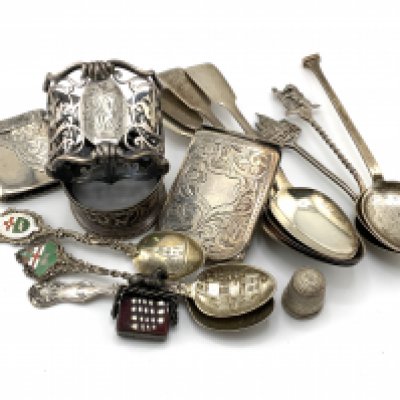 A small collection of silver articles including a Silver and bloodstone lion fob. (A)
