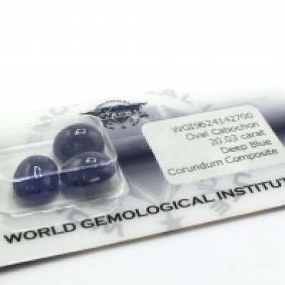 Three security sealed oval cabochon deep blue glass-filled sapphires, 20.03ct. Cert no.WGI9624142700. Postage category a