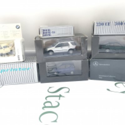 A Collection Of Boxed Mercedes-Benz Dealers Cars And A BMW Isetta.