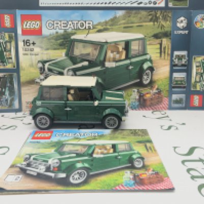 A Lego Mini Cooper #10242 With Box And Manual. Appears Complete. This Lot Cannot Be Posted In House. (2).
