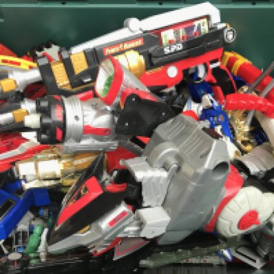 A Box Containing Playworn Power Rangers weapons. Megazords. Etc. No Reserve.