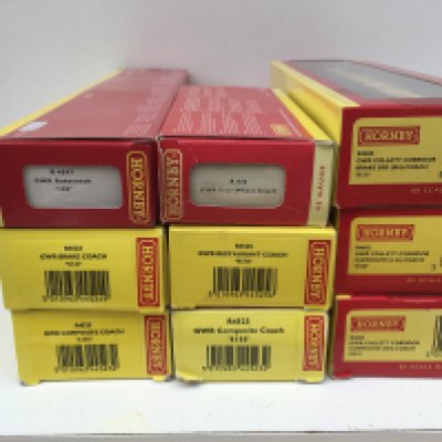 A collection of 9 boxed Hornby 00gauge model railway coaches. No reserve.