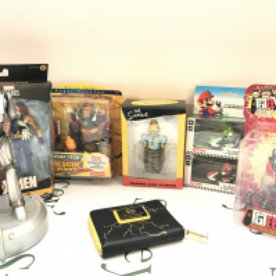 A Collection Of Various Boxed And Loose Toys Including The Simpsons. Mario Kart. Etc. No Reserve.