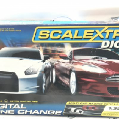 A Boxed Scalextric Nissan GT-R vs Aston Martin DBS Set. Ideal For Spare Parts Etc.No Reserve.