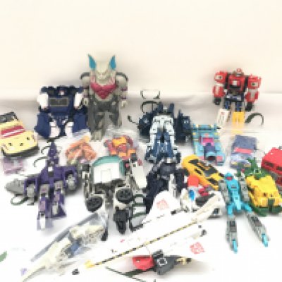 A Box Containing Transformer Toys Ideal For Spare Parts Etc.