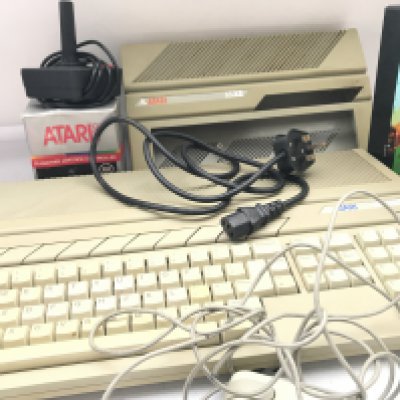 An Atari 1040ST With Joystick. Lead. Etc. Comes With Very Worn Box. No Resrve.