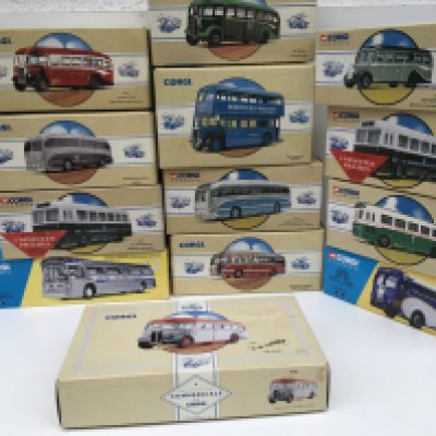 A collection of 13 boxed Corgi classics featuring buses and coaches. Some limited edition with COA. No reserve