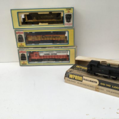 A group of 4 boxed locomotives HO..OO gauge. 3 x atlas and 1 x Wren. No reserve