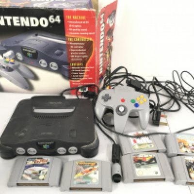 A Boxed Nintendo 64 With A 6 Games. Box Is Worn. No Reserve
