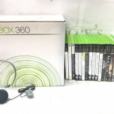 A Boxed Microsoft Xbox 360 with A Collection Of Games.