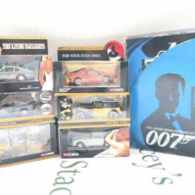 A Collection of Corgi James Bond Cars And A Collection Of The James Bomd Car Collection With Magazines 1-57. No Reserve.(3)