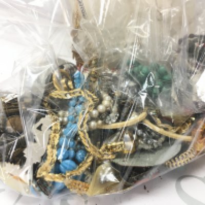 A collection of costume jewellery including bracelets, necklaces, pendants . Postage category B