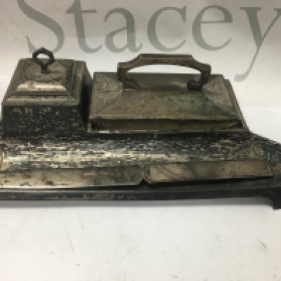 A silver letter opener and a WMF Style pen /ink tray .