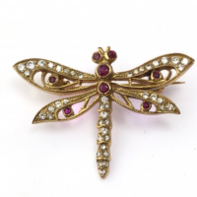 A 9ct gold dragon fly brooch set with diamonds and rubies. 4.91g
