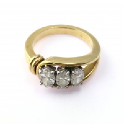An 18ct gold three diamond set ring. Diamonds are Marquise cut and approximately 1.20ct total. Size N and 7.85g