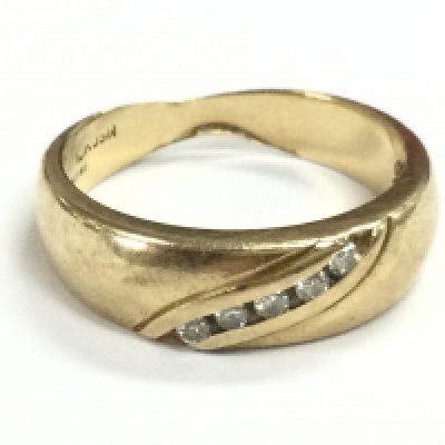 A 9ct gold ring set with a row of diamonds , size S. total weight 5.3g postage category A