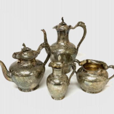 A Victorian four piece silver tea set comprising teapot coffee pot milk jug and sugar bowl 1.955 kg