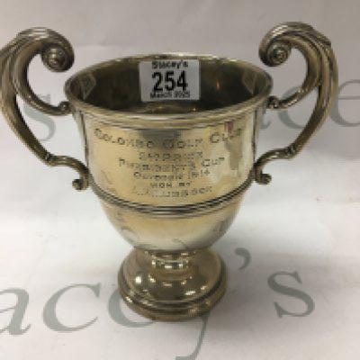 A twin handle silver trophy cup London hallmarks.