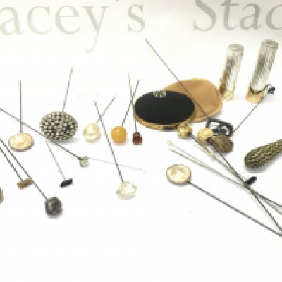 A collection of mainly hatpins to include silver examples, one by Charles Horner. Postage category b