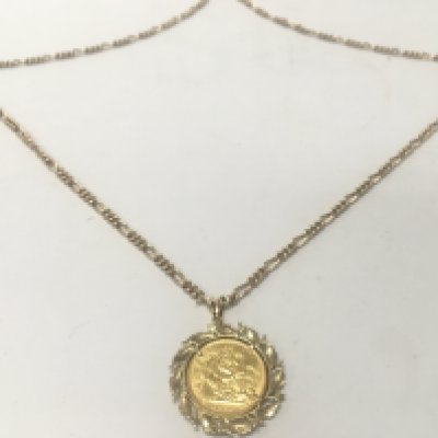 A 2000 full Queen Elizabeth the Second sovereign with mount and 9ct gold chain. Total weight 31.4g