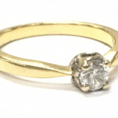 An 18ct gold diamond solitaire ring, size p, 3.7g . Postage category A