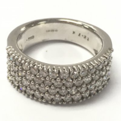 An 18ct white gold four row diamond band ring , size N, total weight 9.9G. Postage category A