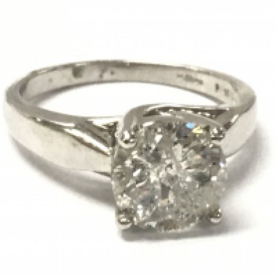 An 18ct white gold 1.5-2 carat diamond solitaire ring, size N , 4.9g total weight. Approximately RS colour , I2/I3. Flawed stone. Postage category A