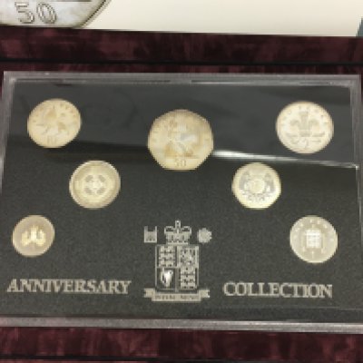 A 1996 royal mint silver anniversary collection. Postage B