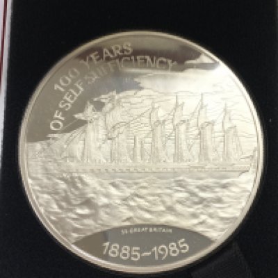 A Falkland islands 100th anniversary sterling silver proof coin.