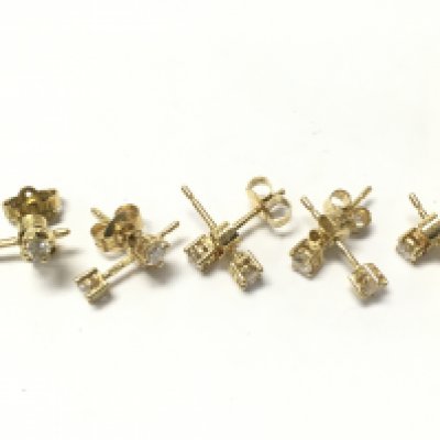 18ct gold diamond studs ,4.8g total weight . Postage category a