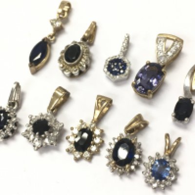 9ct gold mixed diamond and sapphire pendants. Total weight 11g Postage category A