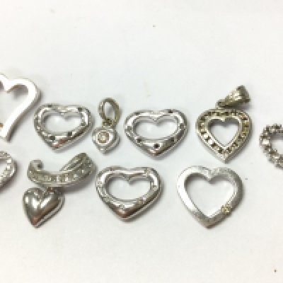9ct white gold diamond heart pendants , 12.7g total weight. Postage category A