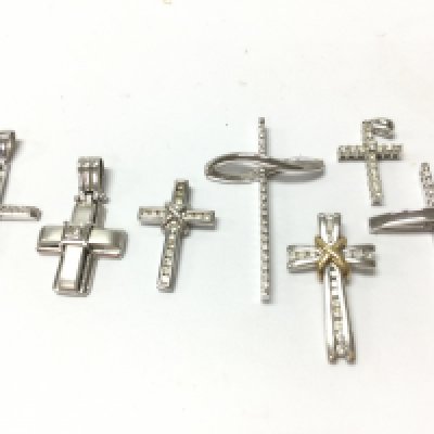 9ct white gold small diamond stones inset cross pendants , 15.2g total weight .postage category A