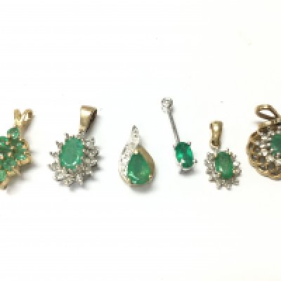 9ct gold Diamond and emerald pendants , 4.3G total weight. Postage category A