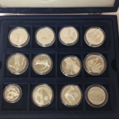 A case containing silver proof coins European Football champions. Fourteen coins with certificates.
